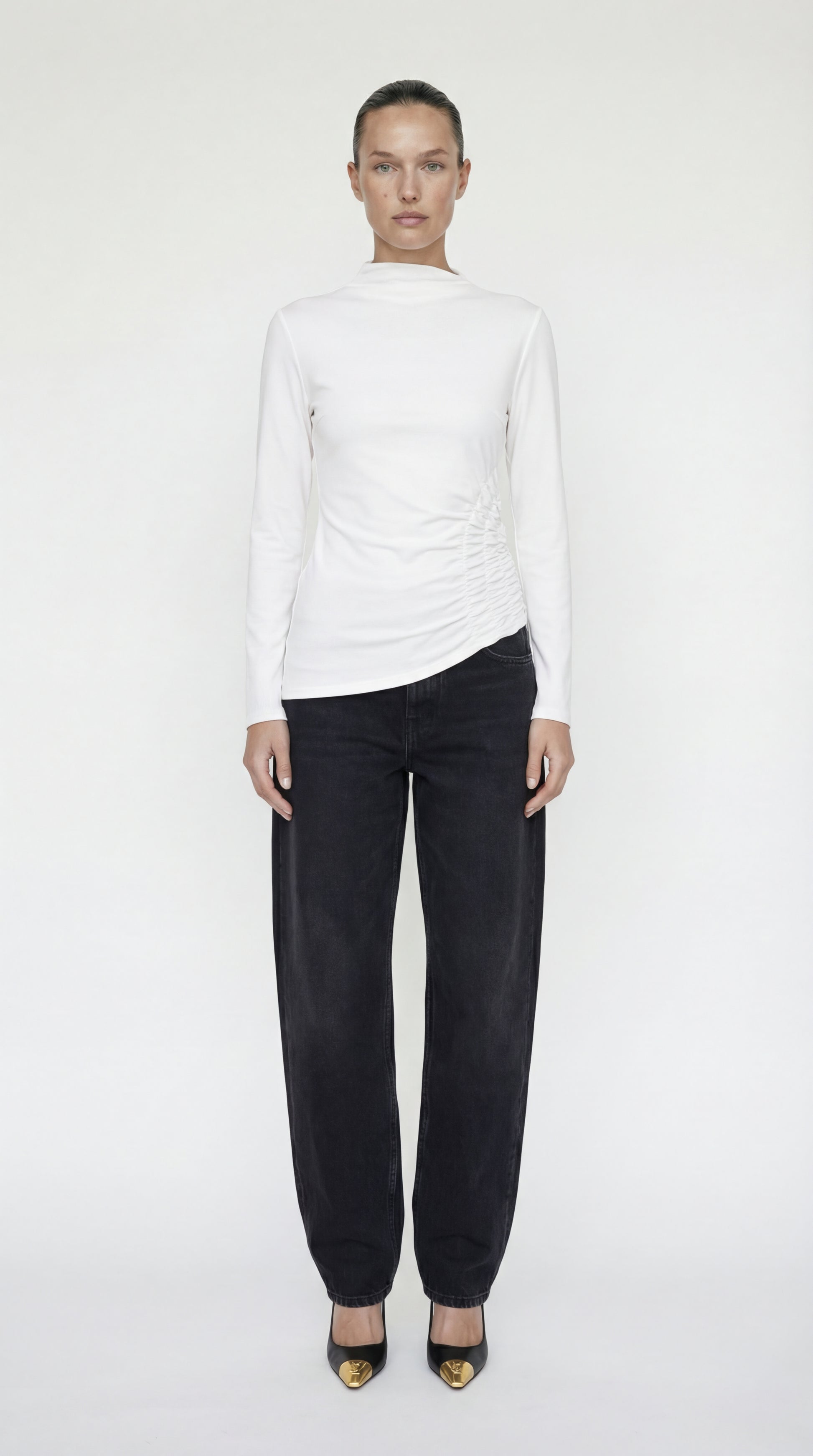 Front view of the Elexiay Toni Shirt, a crisp white mock neck top featuring elegant side ruching and a tailored asymmetrical hem.