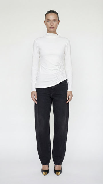 Front view of the Elexiay Toni Shirt, a crisp white mock neck top featuring elegant side ruching and a tailored asymmetrical hem.