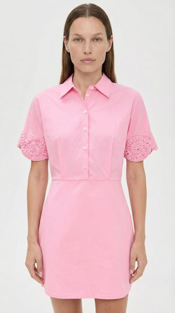 Close-up of the handmade white crochet cuffs on the bubblegum pink Ebube shirt dress, showcasing Elexiay’s signature Nigerian craftsmanship.