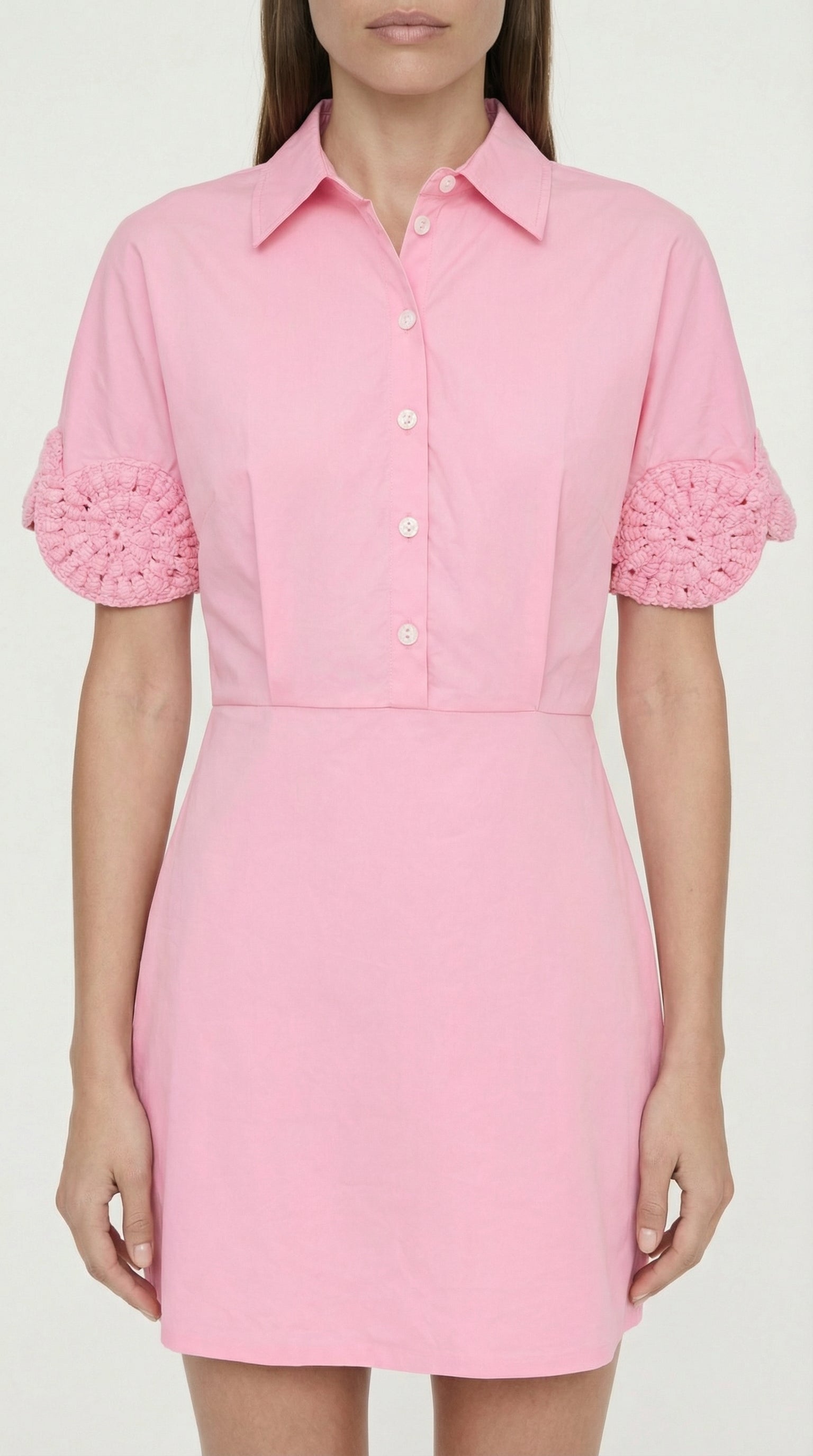 Full-length shot of the Ebube mini dress in a vibrant bubblegum pink hue, perfect for the Barbiecore aesthetic or summer brunch parties.