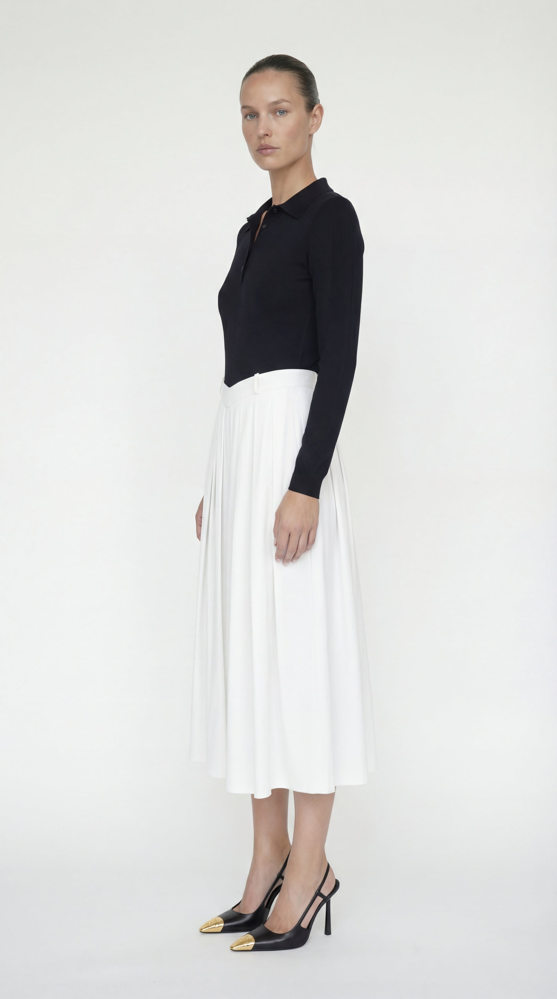 Side view of the Sonia Dress highlighting the structured waist and functional on-seam side pockets