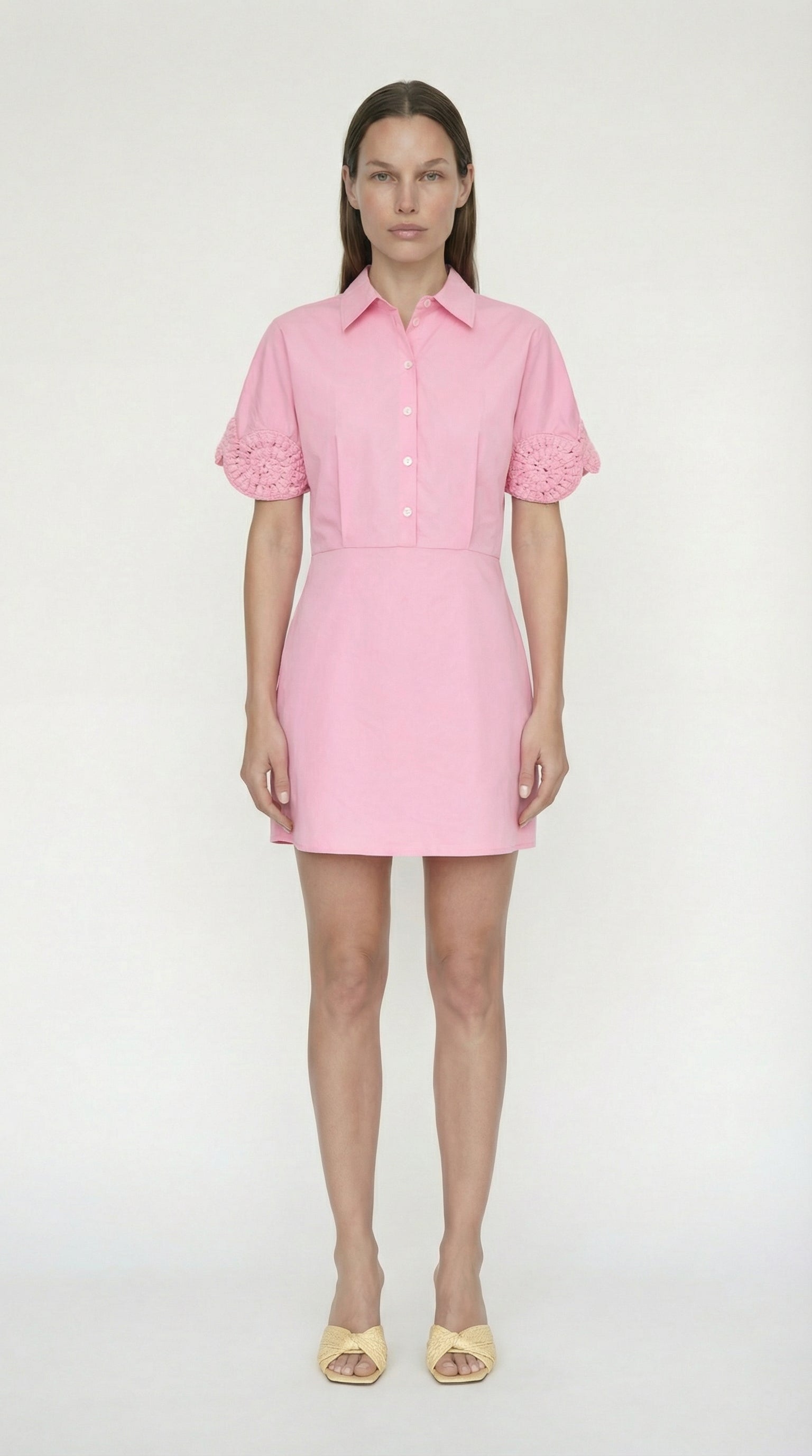 Model wearing the ethically made elexiay Ebube shirt dress, highlighting 100% natural cotton fabric and zero-machine crochet details.